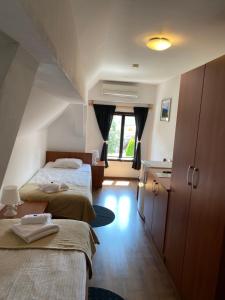 Postel nebo postele na pokoji v ubytování B&B Rot