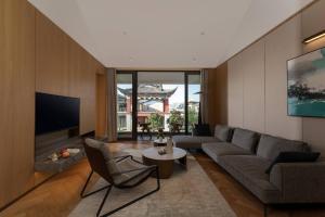 TV a/nebo společenská místnost v ubytování Papuman hotel