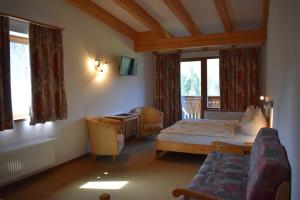 Postel nebo postele na pokoji v ubytování romy's B&B + 4 fotografie