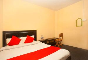 Postel nebo postele na pokoji v ubytování Namaste Resort
