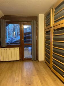 Posteľ alebo postele v izbe v ubytovaní Cervinia appartamento monolocale