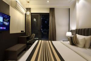 Fotografie z fotogalerie ubytování OPO Hotel Iffco Chowk v destinaci Gurgáon