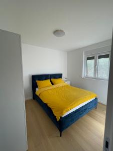 Katil atau katil-katil dalam bilik di VALI Apartment