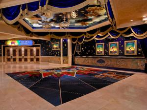 a large room with a floor with a colorful carpet at Treasure Island - TI Las Vegas Hotel & Casino, a Radisson Hotel in Las Vegas