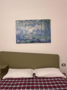 Postel nebo postele na pokoji v ubytování Domus Angriae Apartment