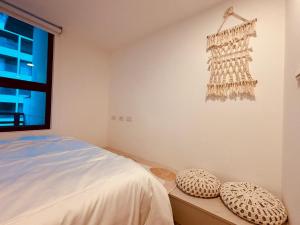 Een bed of bedden in een kamer bij 礁溪 Hao Hao