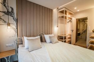Postel nebo postele na pokoji v ubytování Apartament Aspen