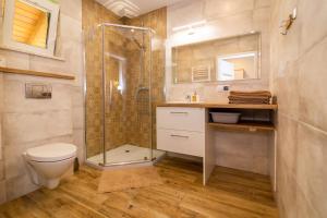 Koupelna v ubytování Apartament Marta