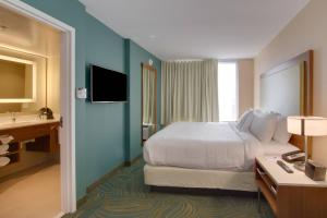 Postel nebo postele na pokoji v ubytování SpringHill Suites by Marriott Orlando Lake Buena Vista South