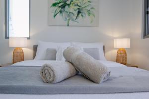 Postel nebo postele na pokoji v ubytování Nova Apartment Mooloolaba Beach + 15 fotografií