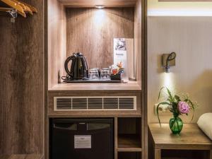 Кухня или мини-кухня в Mercure Oostende
