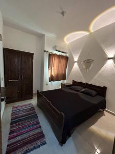 Postel nebo postele na pokoji v ubytování Happy House