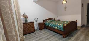 En eller flere senge i et værelse på HalimeHome