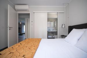 Postel nebo postele na pokoji v ubytování Residence Saletta Casale