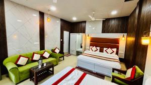 Ένα ή περισσότερα κρεβάτια σε δωμάτιο στο Hotel Amar