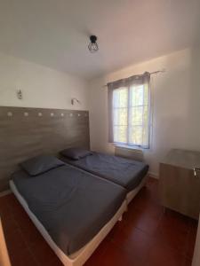Postel nebo postele na pokoji v ubytování Appartement Sainte Cécile