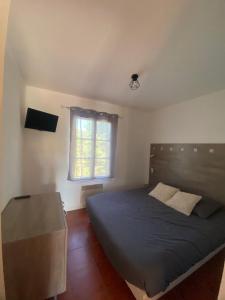 Postel nebo postele na pokoji v ubytování Appartement Sainte Cécile
