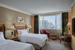 Postel nebo postele na pokoji v ubytování Le Meridien Makkah + 20 fotografií