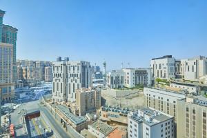 an aerial view of a city with tall buildings at Le Meridien Makkah in Mecca