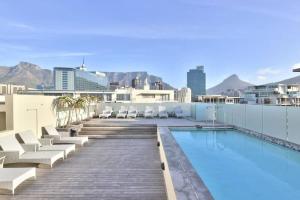 a pool on the roof of a building at Harbour Bridge 33C in Cape Town