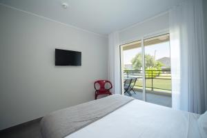 TV a/nebo společenská místnost v ubytování Residence Saletta Casale