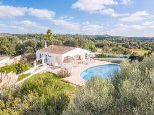 an aerial view of a villa with a swimming pool at Finca Calafi Nou by Sonne Villas in Cala Galdana