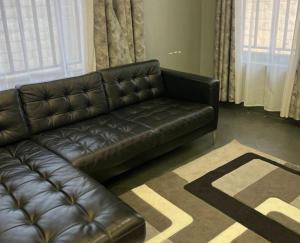 Posezení v ubytování Au coin de la rue de Goma