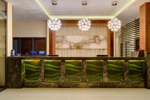 Posezení v ubytování Protea Hotel by Marriott Benin City Select Emotan