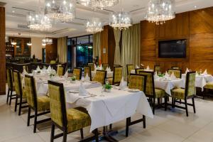 Restaurace v ubytování Protea Hotel by Marriott Benin City Select Emotan