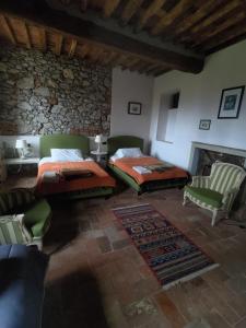 Postel nebo postele na pokoji v ubytování Piaggetta B&B