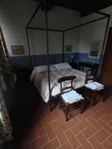 Postel nebo postele na pokoji v ubytování Piaggetta B&B