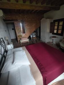 Postel nebo postele na pokoji v ubytování Piaggetta B&B
