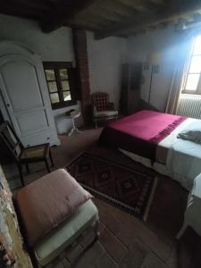 Postel nebo postele na pokoji v ubytování Piaggetta B&B