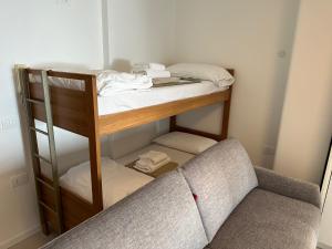 Ένα ή περισσότερα κρεβάτια σε δωμάτιο στο Residence Bristol Bibione