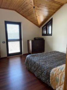 Postel nebo postele na pokoji v ubytování Stone Villa Ballabanec Kruje