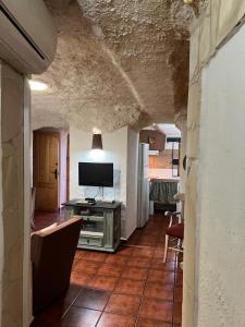 Kuchyň nebo kuchyňský kout v ubytování Casas Rurales Maribel - Complejo El Tejar - Apartamentos con jacuzzi en Alcalá del Júcar