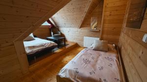 Postel nebo postele na pokoji v ubytování Chata Wald