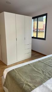 Postel nebo postele na pokoji v ubytování Apartments VMadeira