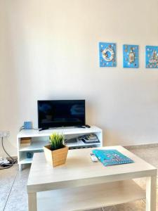 Et tv og/eller underholdning på H&O Diana Holiday Apartment