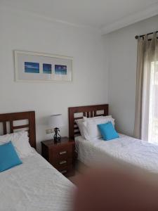 Postel nebo postele na pokoji v ubytování Beautiful family villa on Roda Golf and Beach Resort