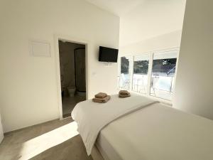 Postel nebo postele na pokoji v ubytování Apartments Tereza