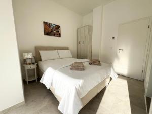 Postel nebo postele na pokoji v ubytování Apartments Tereza