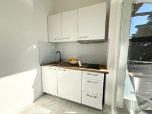 Kuchyň nebo kuchyňský kout v ubytování Apartments Tereza