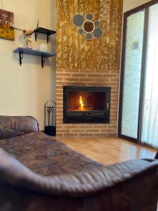 Posezení v ubytování Casas Rurales Maribel - Complejo El Tejar - Apartamentos con jacuzzi en Alcalá del Júcar