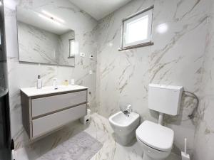 Koupelna v ubytování Apartments Tereza
