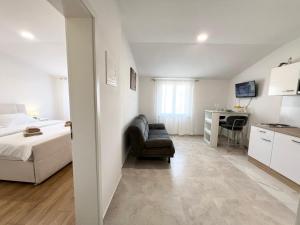 Postel nebo postele na pokoji v ubytování Apartments Tereza