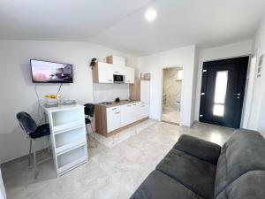 Kuchyň nebo kuchyňský kout v ubytování Apartments Tereza