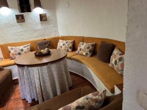Posezení v ubytování Casas Rurales Maribel - Complejo El Tejar - Apartamentos con jacuzzi en Alcalá del Júcar