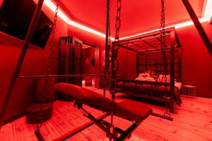 Telewizja i/lub zestaw kina domowego w obiekcie Secret Love BDSM