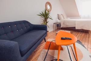 Χώρος καθιστικού στο Loft lumineux très spacieux - Parking gratuit